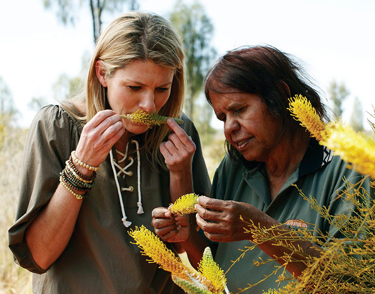 Women in Australia smelling reeds