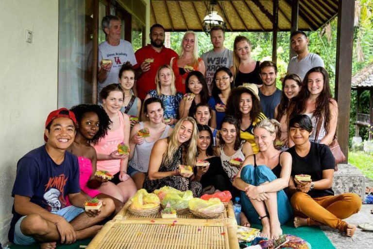 Group enjoying food and drinks together.
